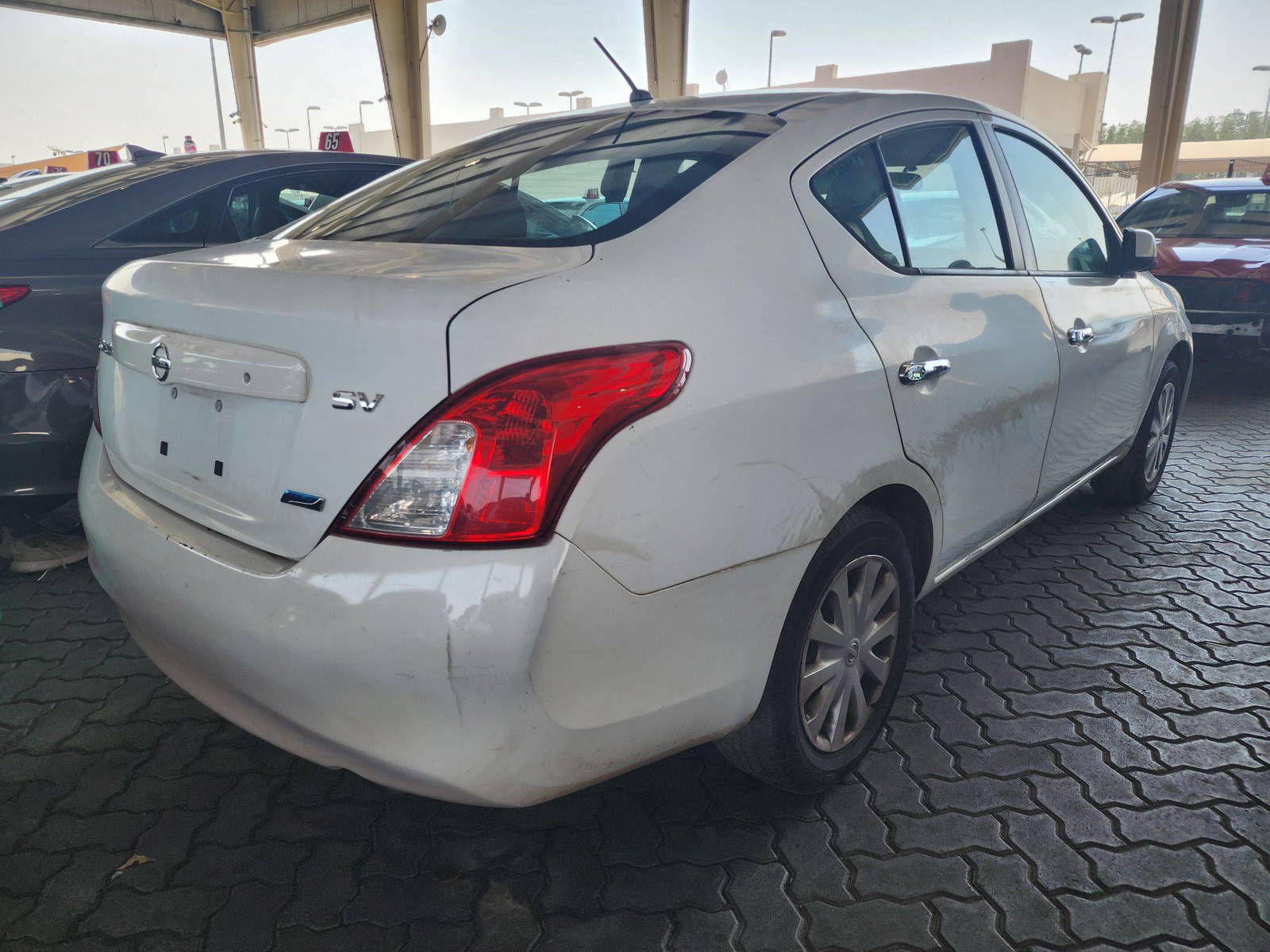 2012 NISSAN VERSA — 154775 Miles — Lot 38379950 — Souq - Marhaba Auctions Used Cars - Image 3