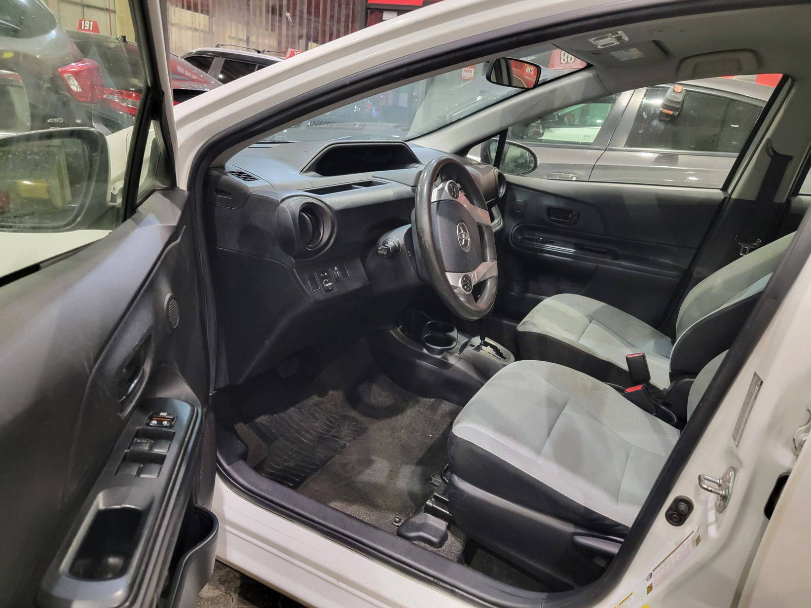 2015 TOYOTA PRIUS C — 303302 Miles — Lot 64455355 — Main - Marhaba Auctions Used Cars - Image 7