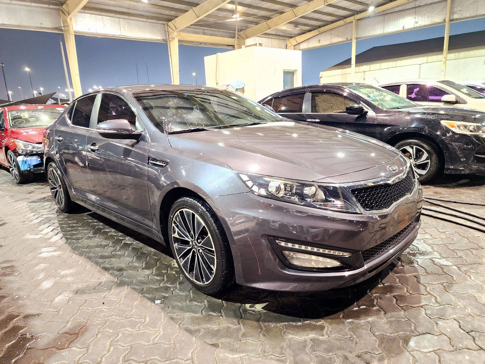 2011 KIA K5 — 231522 KM — Lot 107917 — Souq - Marhaba Auctions Used Cars - Image 4