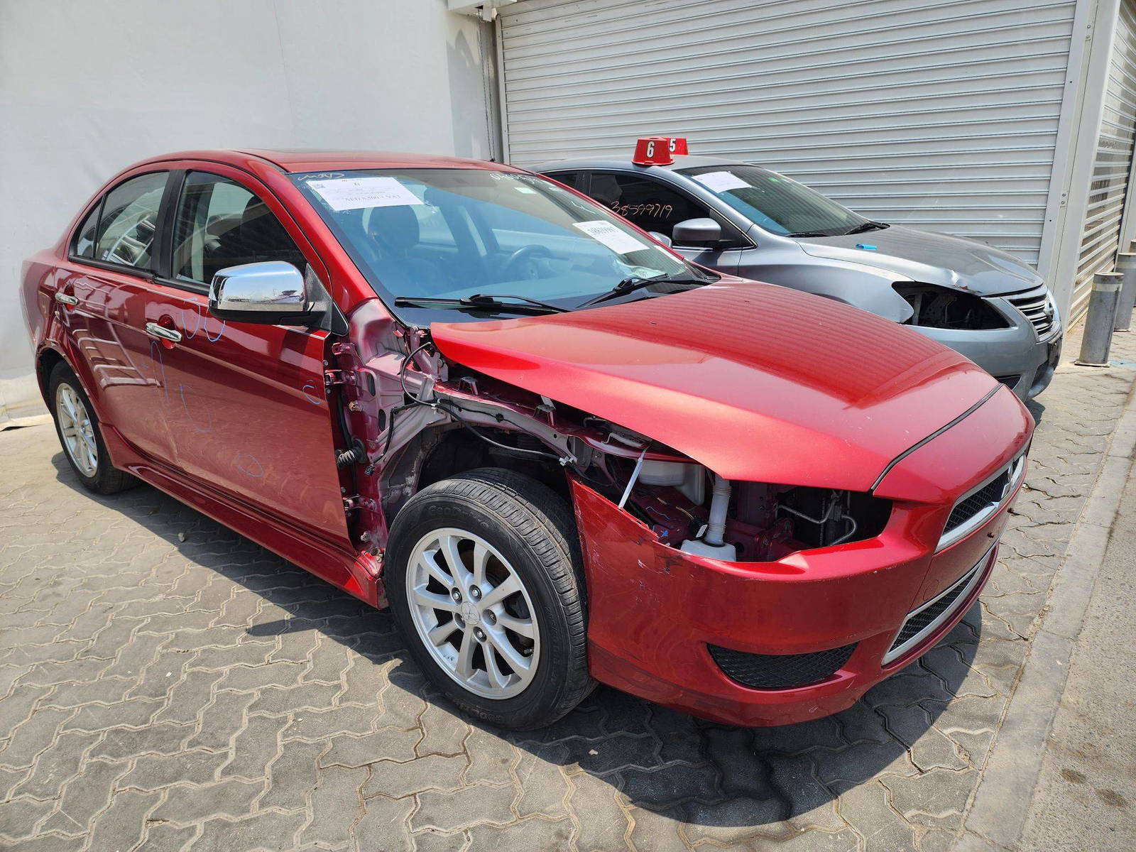 2011 MITSUBISHI LANCER — 124588 Miles — Lot 38839903 — Souq - Marhaba Auctions Used Cars - Image 4