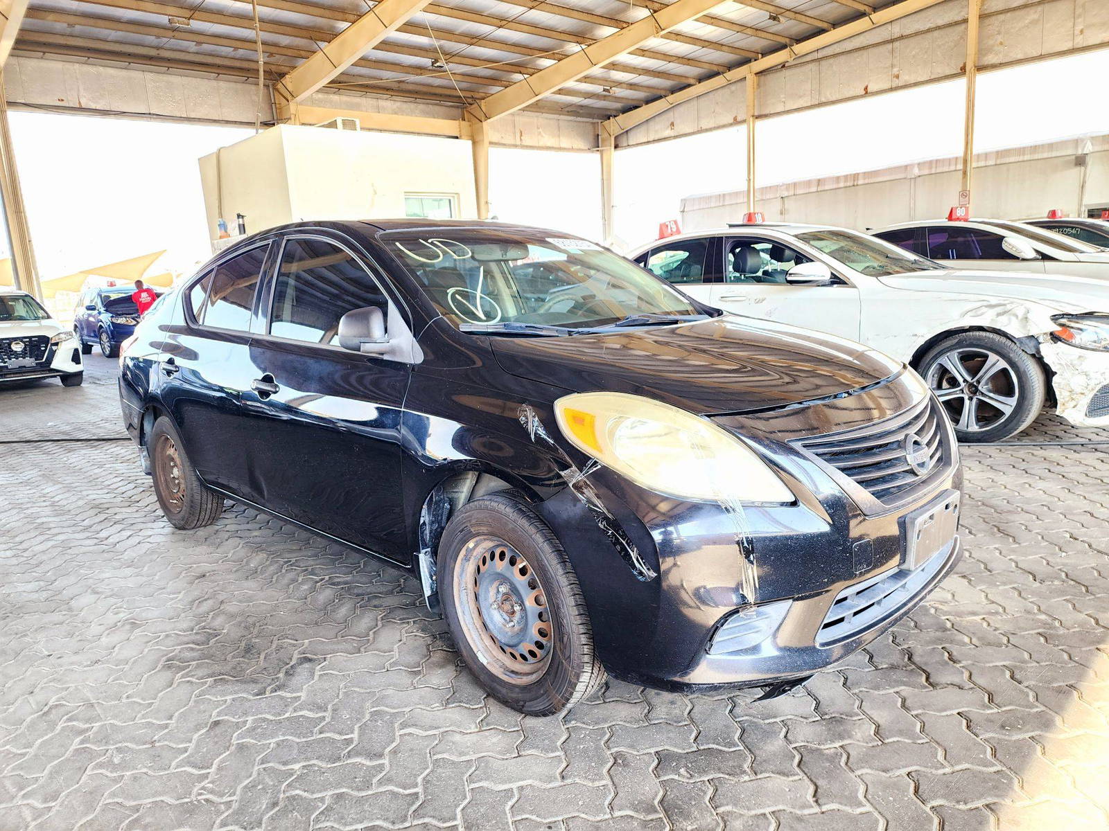 2012 NISSAN VERSA — 204442 Miles — Lot 68132754 — Souq - Marhaba Auctions Used Cars - Image 4