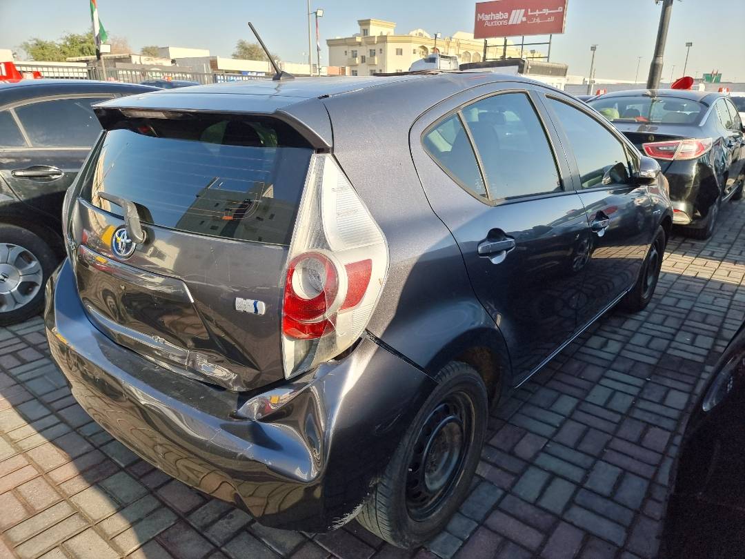 2014 TOYOTA PRIUS C — 274270 Miles — Lot 215487 — Ind. 12 - Marhaba Auctions Used Cars - Image 4