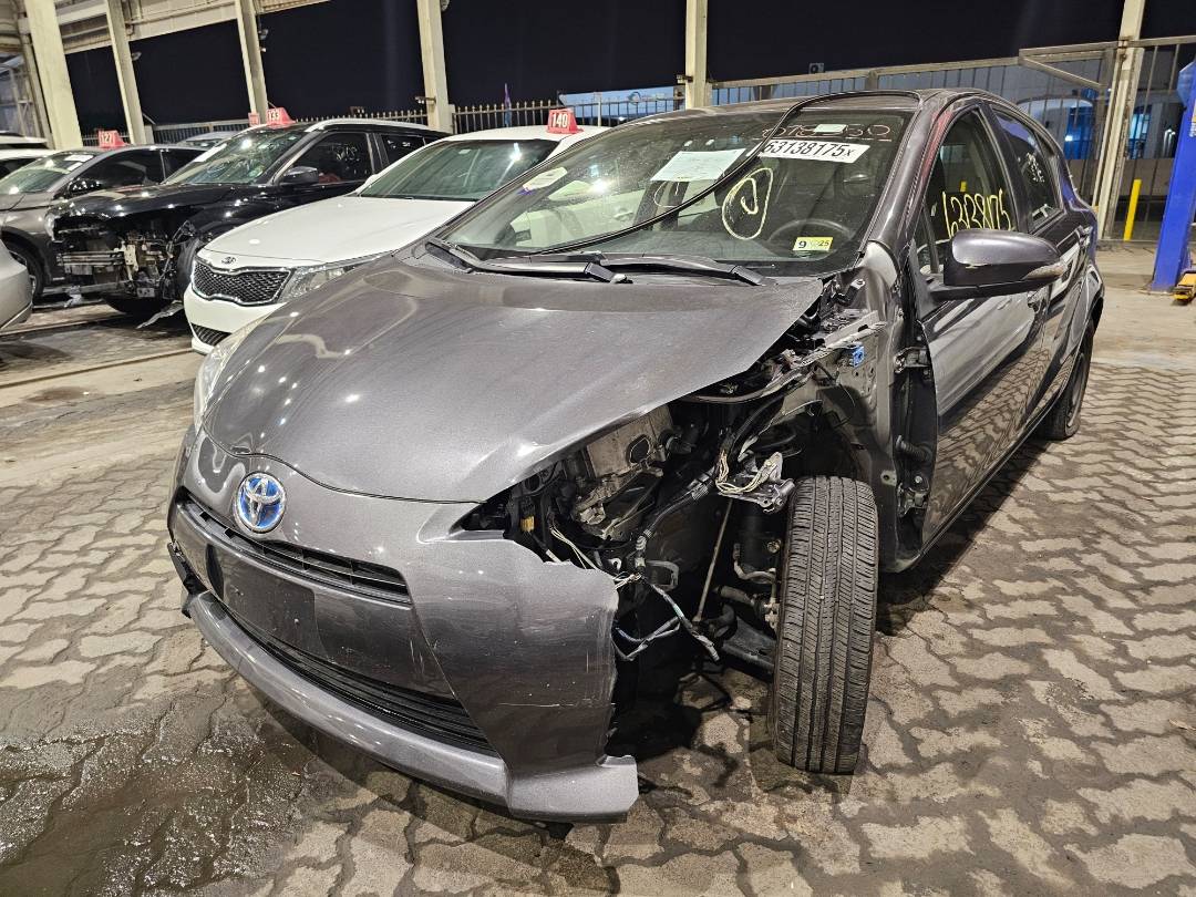 2014 TOYOTA PRIUS C — 125564 Miles — Lot 9E1078350 — Souq - Marhaba Auctions Used Cars - Image 4