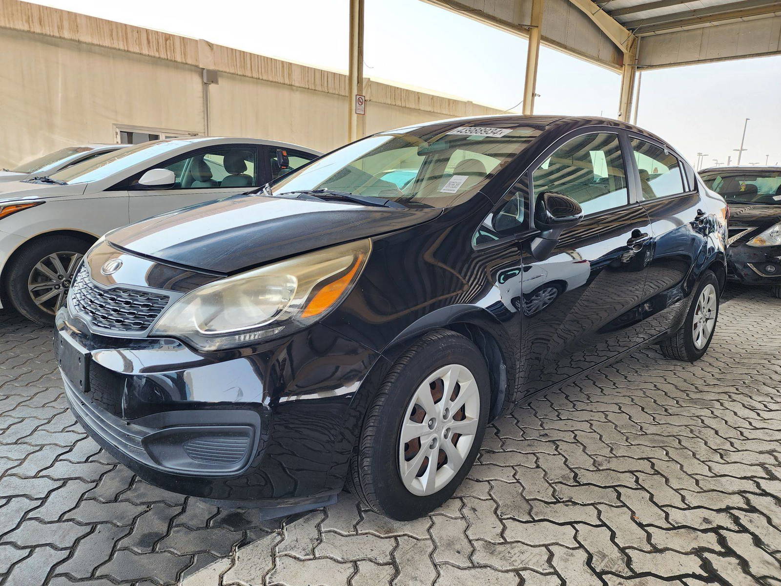 2014 KIA RIO — 119965 Miles — Lot 43988934 — Souq - Marhaba Auctions Used Cars - Image 5