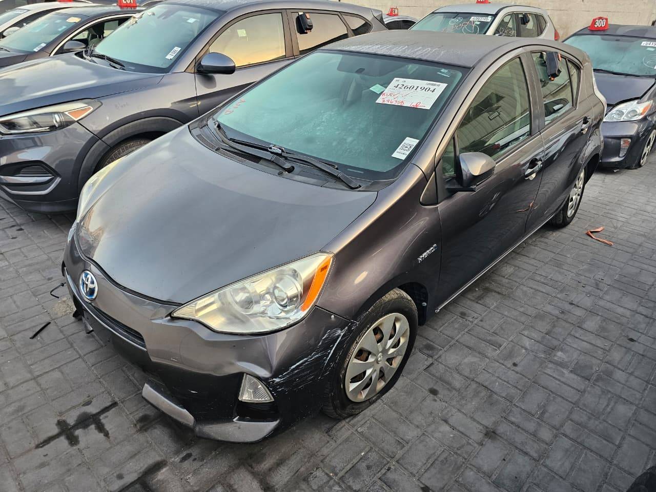 2014 TOYOTA PRIUS C — 246358 Miles — Lot 42601904 — Main - Marhaba Auctions Used Cars - Image 4