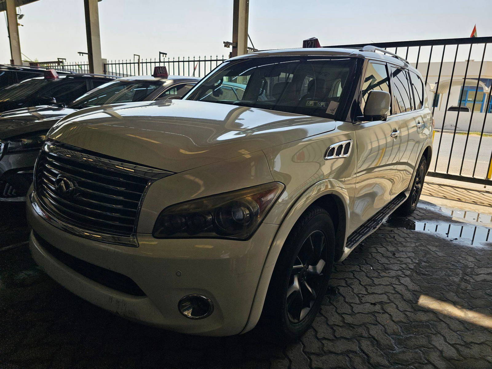 2011 INFINITI QX56 — 167591 Miles — Lot 43922342 — Main - Marhaba Auctions Used Cars - Image 3