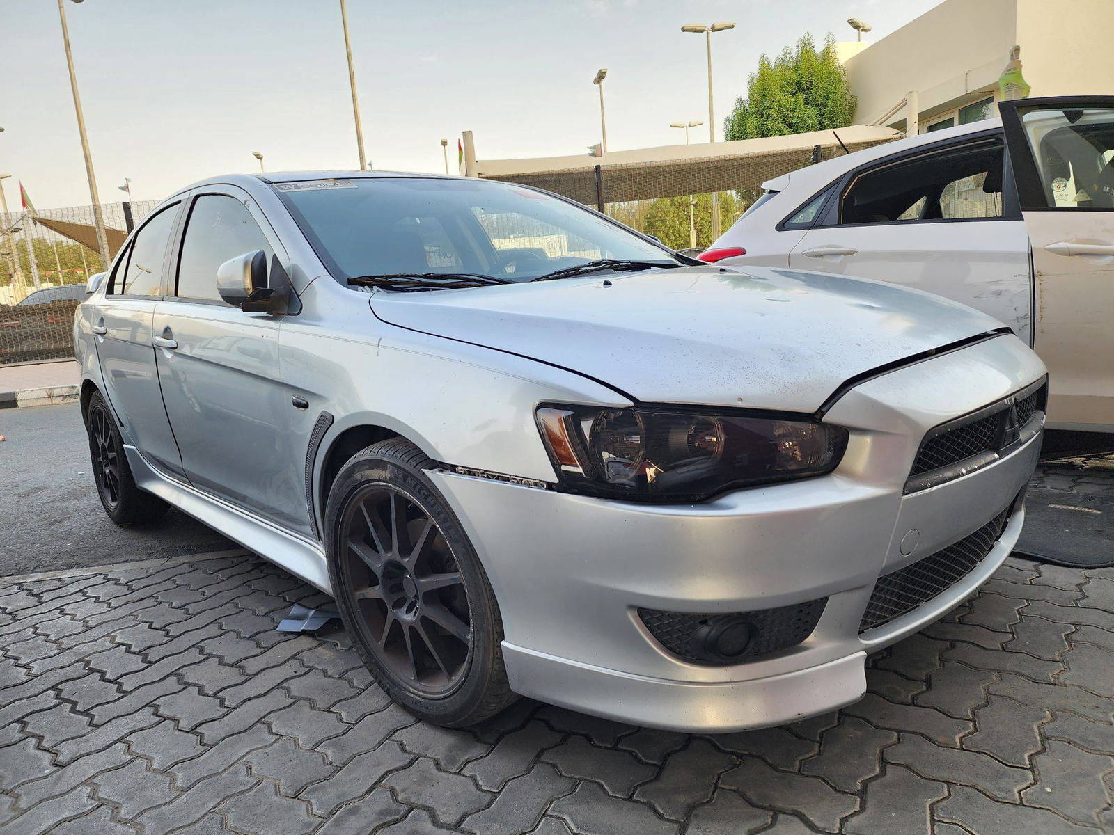 2011 MITSUBISHI LANCER — 156309 Miles — Lot 329131 — Souq - Marhaba Auctions Used Cars - Image 4