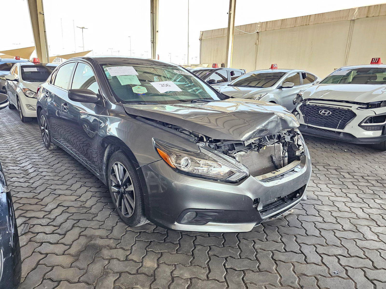 2017 NISSAN ALTIMA — 137898 Miles — Lot 59222515 — Main - Marhaba Auctions Used Cars - Image 4