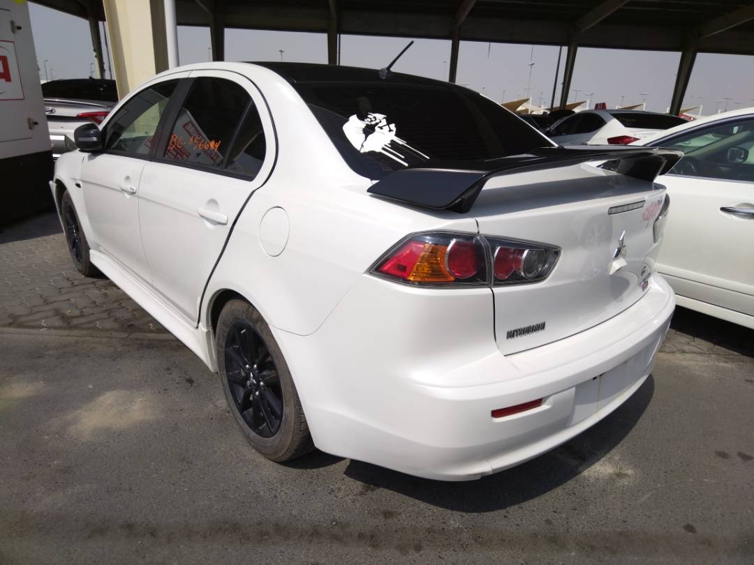 2017 MITSUBISHI LANCER — 118544 KM — Lot 607162 - Marhaba Auctions Used Cars - Image 4