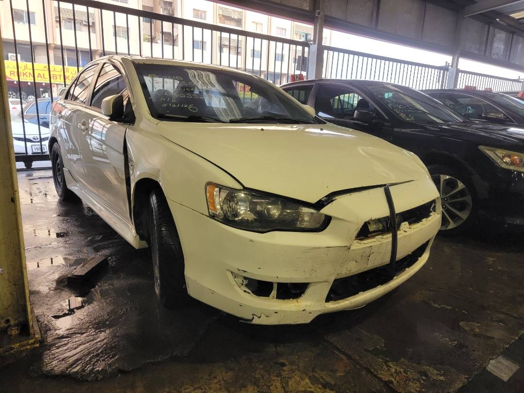 2015 MITSUBISHI LANCER — 262979 KM — Lot 12319502 — Main - Marhaba Auctions Used Cars - Image 3