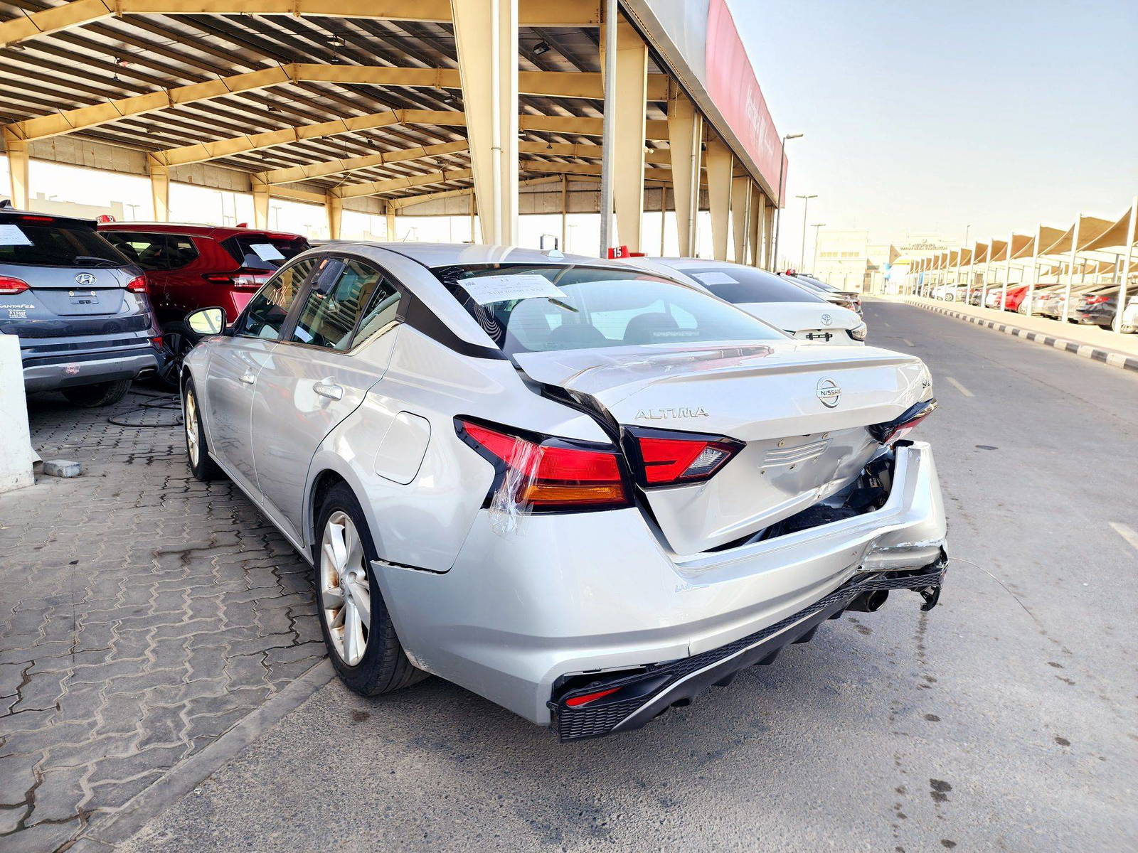 2019 NISSAN ALTIMA — 133008 Miles — Lot XKC159243 — Souq - Marhaba Auctions Used Cars - Image 4