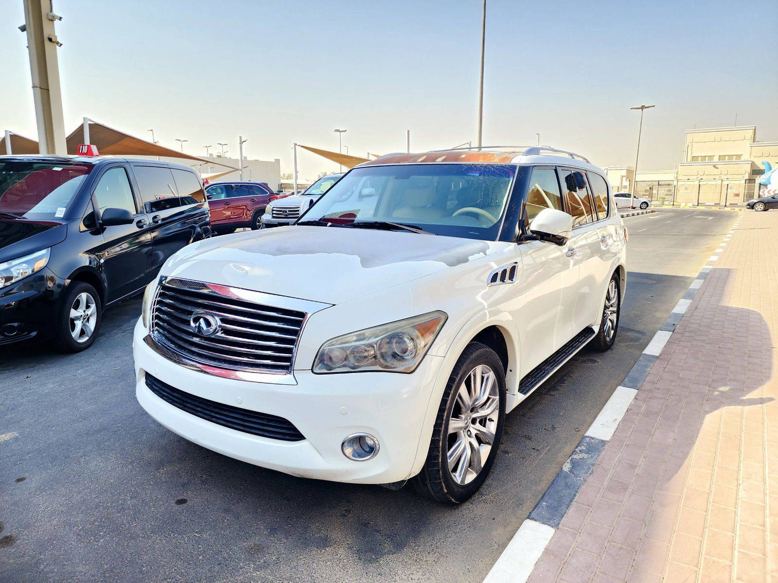 2013 INFINITI QX56 — 195130 Miles — Lot NE4D9060802 — Souq - Marhaba Auctions Used Cars - Image 4