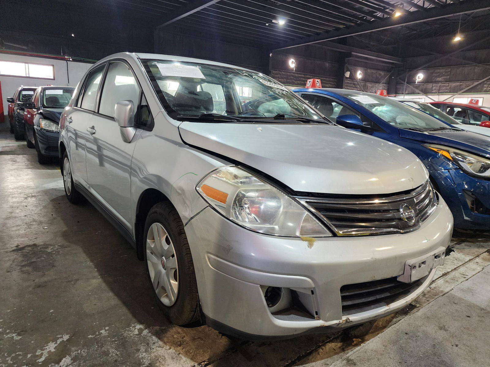 2010 NISSAN VERSA — 203094 Miles — Lot 63283074 — Al Quoz - Marhaba Auctions Used Cars - Image 4