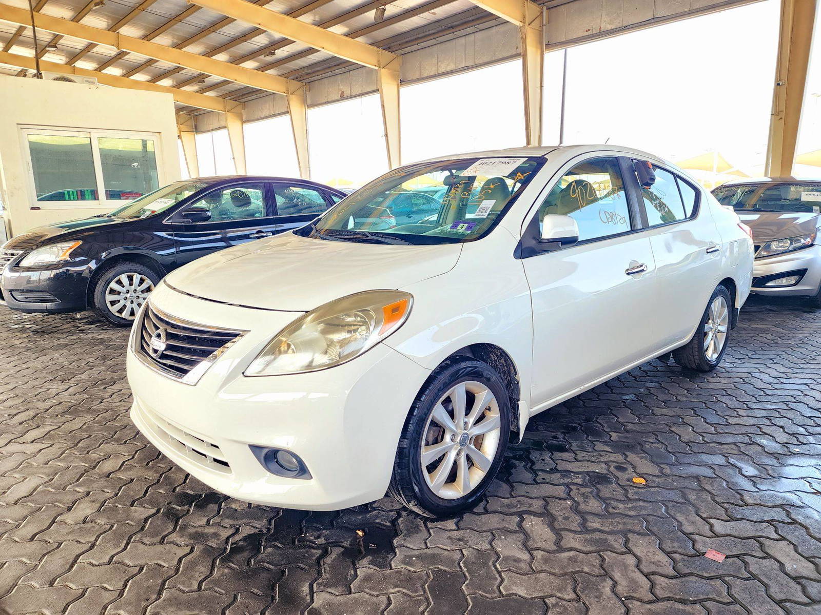 2014 NISSAN VERSA — 105693 Miles — Lot 40217987 — Souq - Marhaba Auctions Used Cars - Image 5