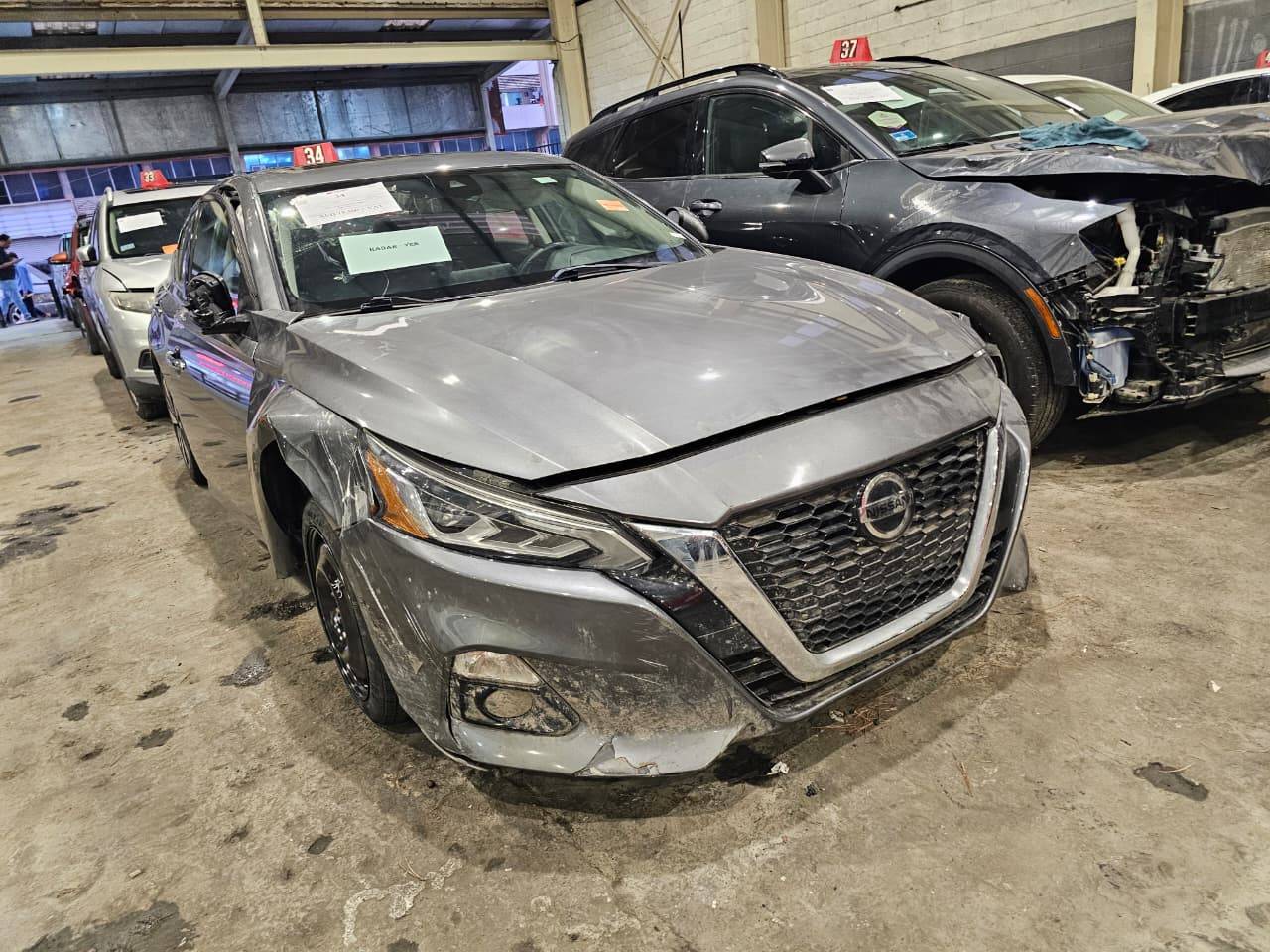2019 NISSAN ALTIMA — 63585 Miles — Lot 43824121 — Al Sajaa - Marhaba Auctions Used Cars - Image 4