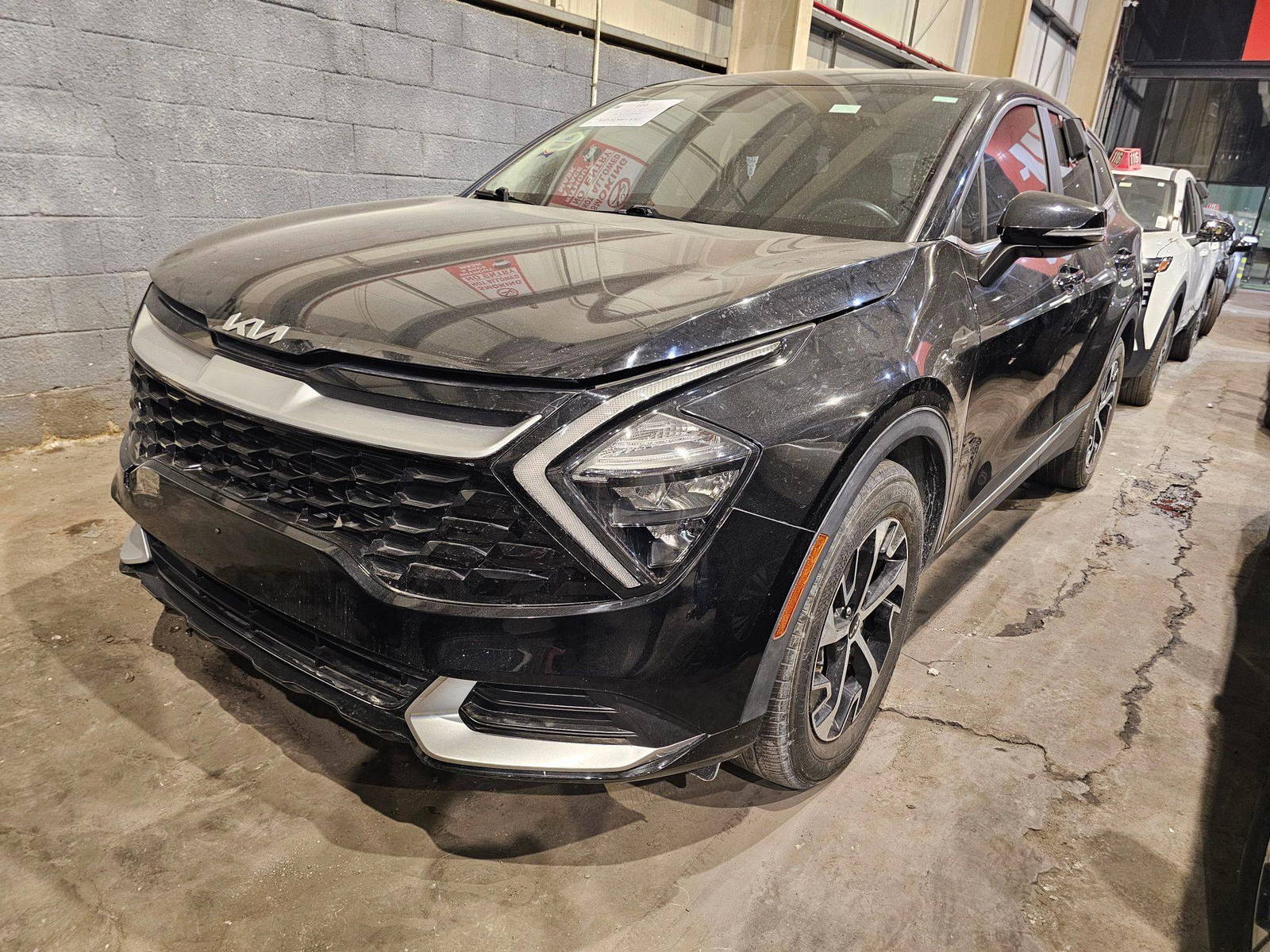 2023 KIA SPORTAGE — sold — 53920 KM — Lot G104378 — Main - Marhaba Auctions Used Cars - Image 4
