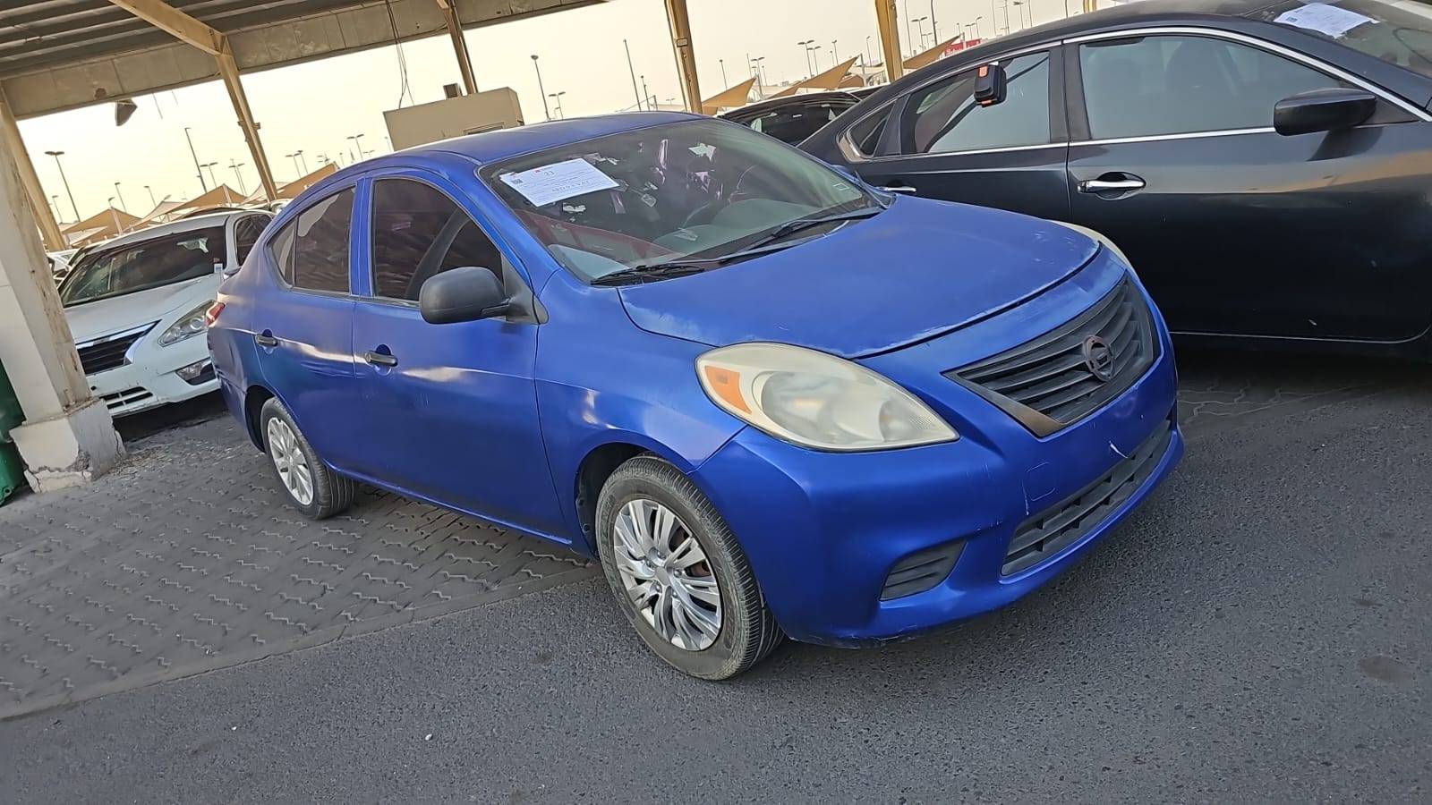 2014 NISSAN VERSA — 133819 Miles — Lot 4EL857650 — Souq - Marhaba Auctions Used Cars - Image 2