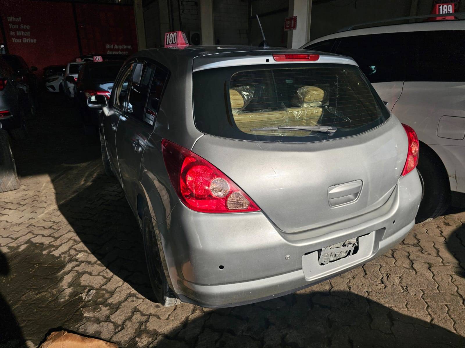 2007 NISSAN TIDA — 470043 KM — Lot T000610 — Main - Marhaba Auctions Used Cars - Image 4