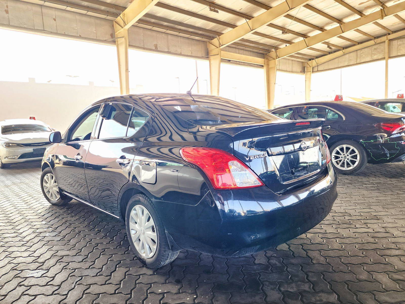2014 NISSAN VERSA — 129131 Miles — Lot 64651 — Souq - Marhaba Auctions Used Cars - Image 3