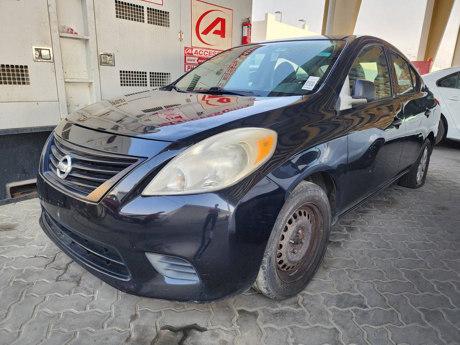 2014 NISSAN VERSA — 157791 Miles — Lot 39055487 — Souq - Marhaba Auctions Used Cars - Image 9