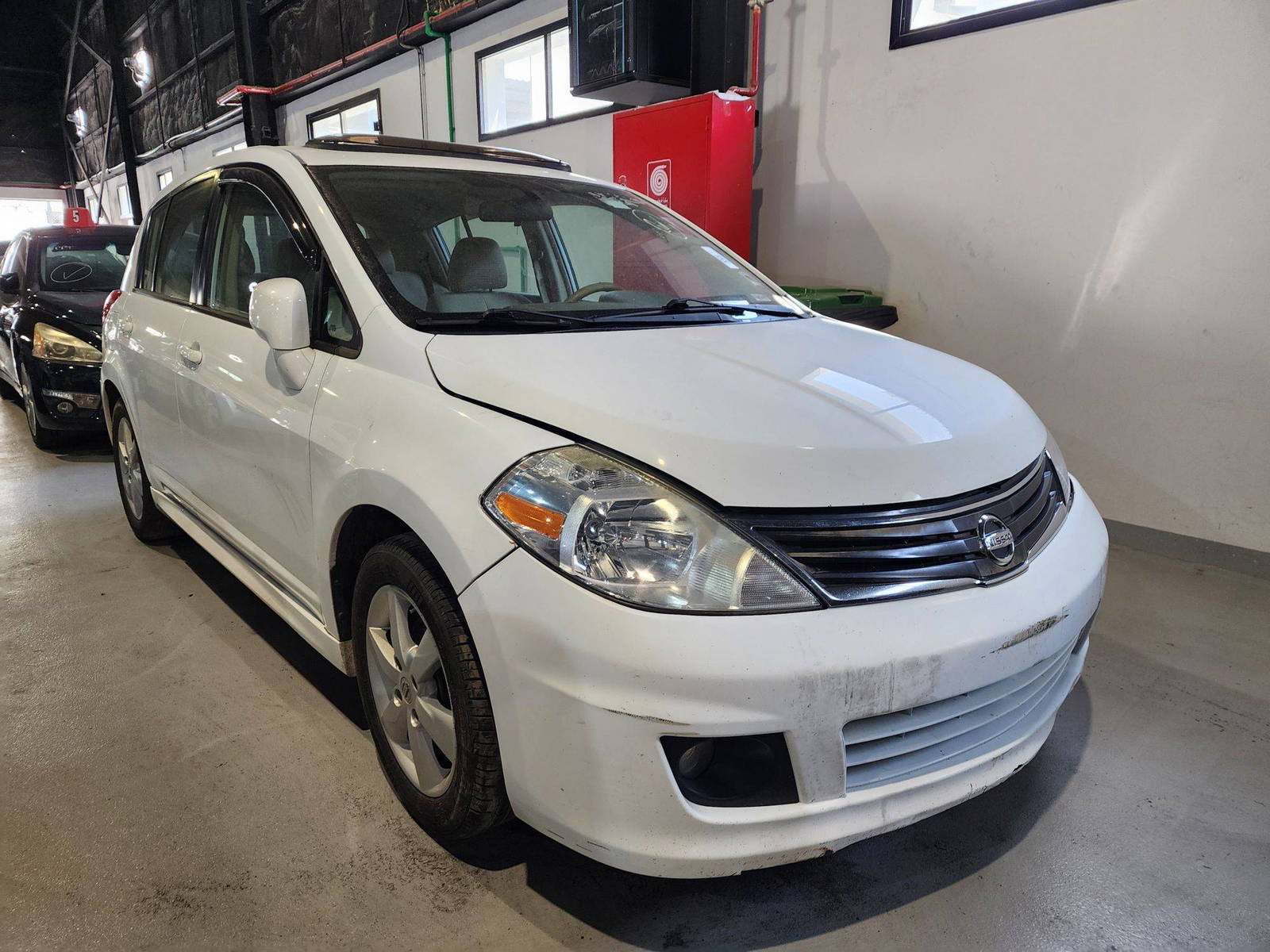 2011 NISSAN VERSA — 198678 Miles — Lot 491003 — Al Quoz - Marhaba Auctions Used Cars - Image 4