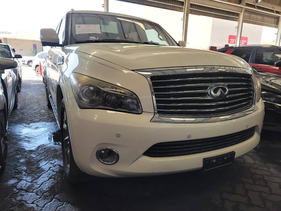 2014 INFINITI QX80 — 144833 Miles — Lot 1E9551385 — Main - Marhaba Auctions Used Cars - Image 4