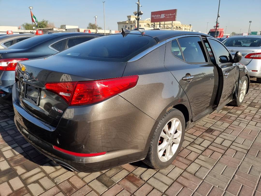 2012 KIA OPTIMA — 176799 Miles — Lot 125487 — Souq - Marhaba Auctions Used Cars - Image 4