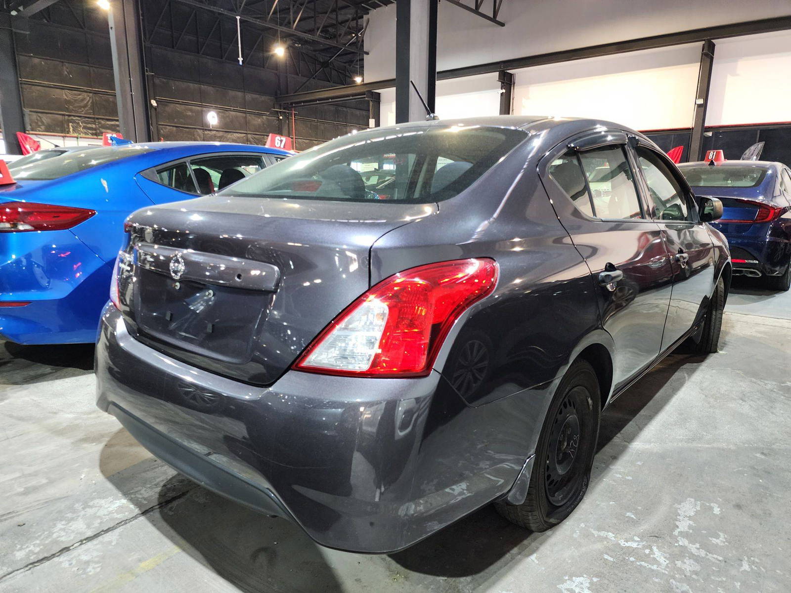 2015 NISSAN VERSA — 131694 Miles — Lot 16225 — Al Quoz - Marhaba Auctions Used Cars - Image 3