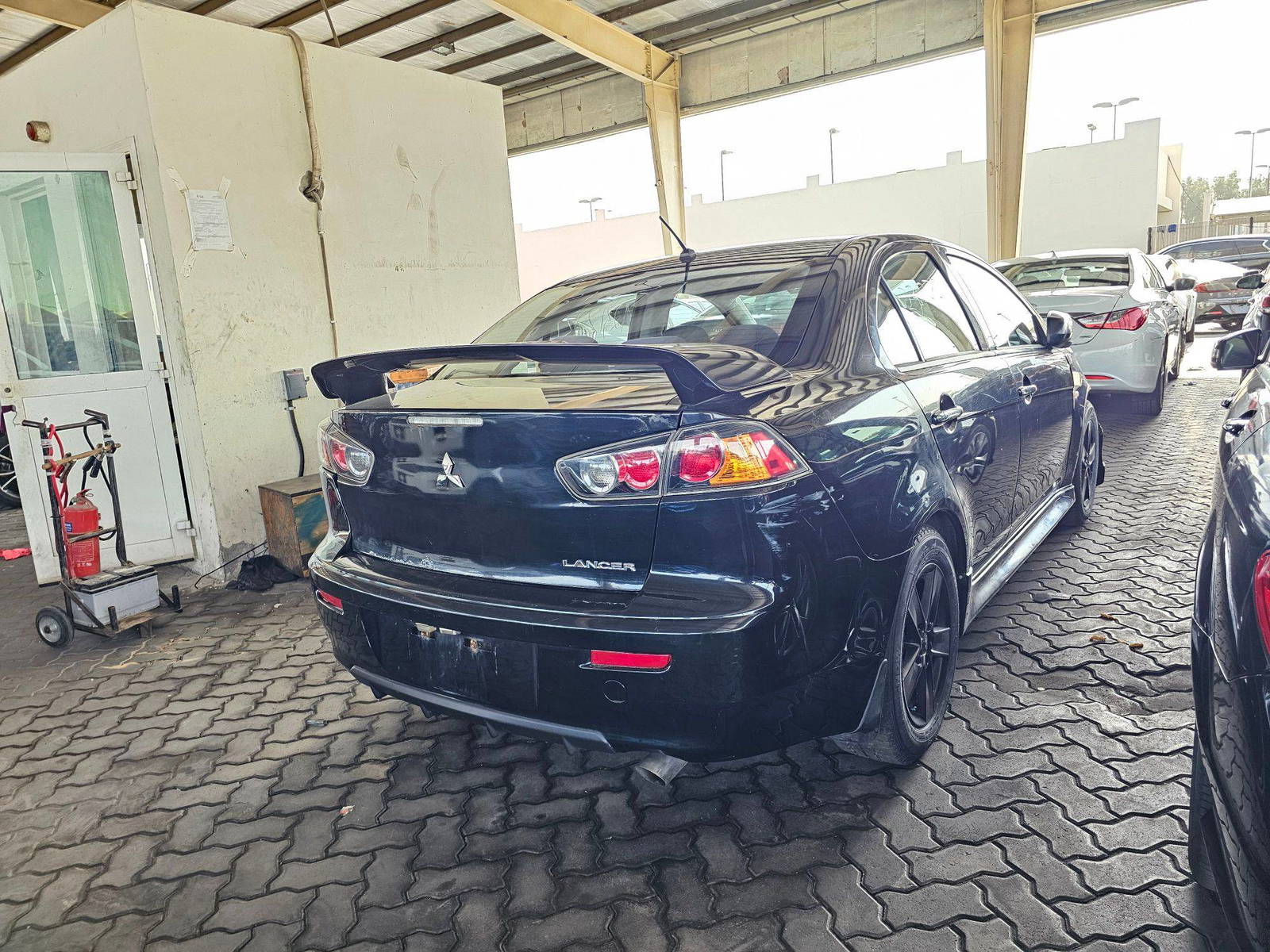 2013 MITSUBISHI LANCER — 219047 KM — Lot 12312227 — Main - Marhaba Auctions Used Cars - Image 3