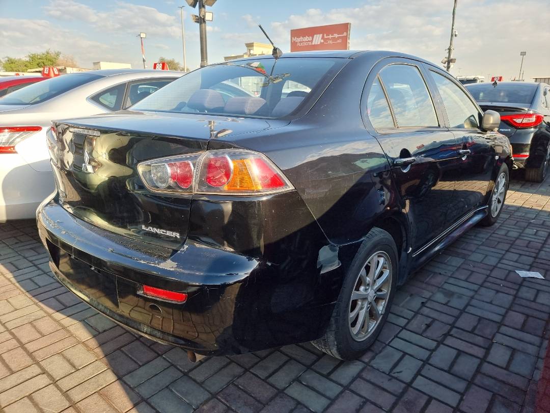 2010 MITSUBISHI LANCER — 164053 Miles — Lot 125478 — Ind. 12 - Marhaba Auctions Used Cars - Image 4