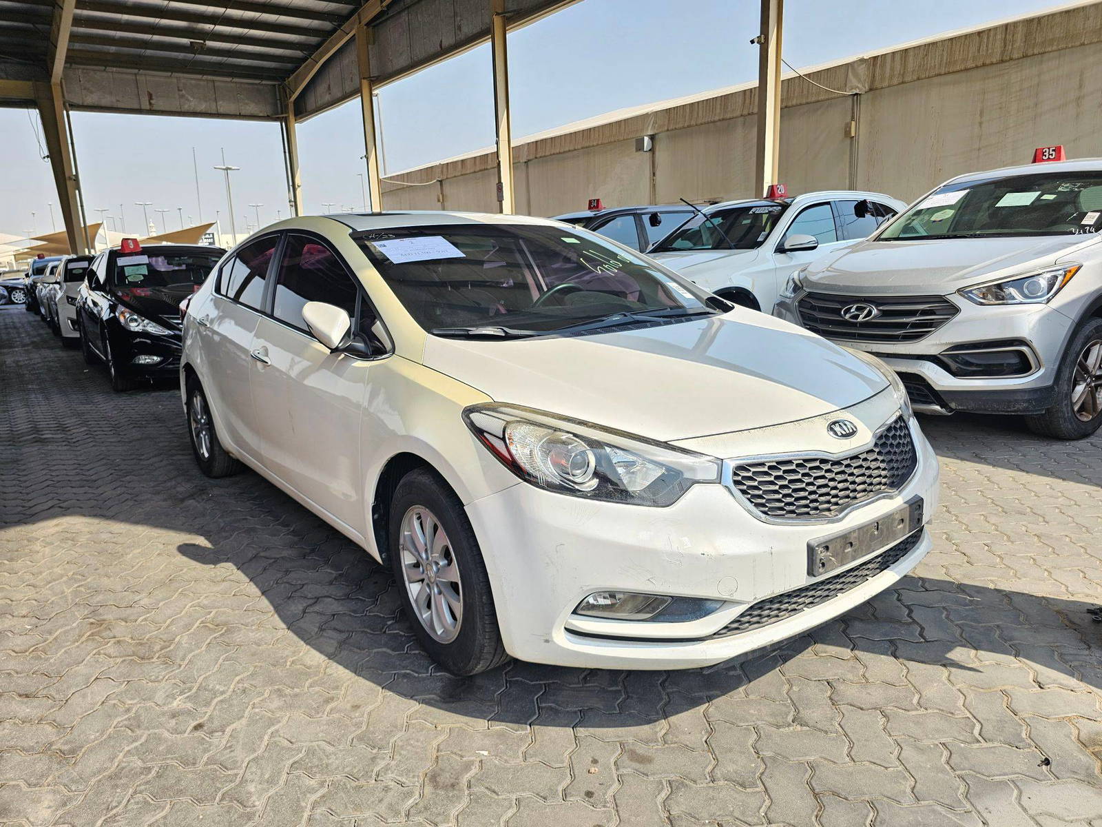 2014 KIA K3 — 108355 KM — Lot 164037 — Souq - Marhaba Auctions Used Cars - Image 4
