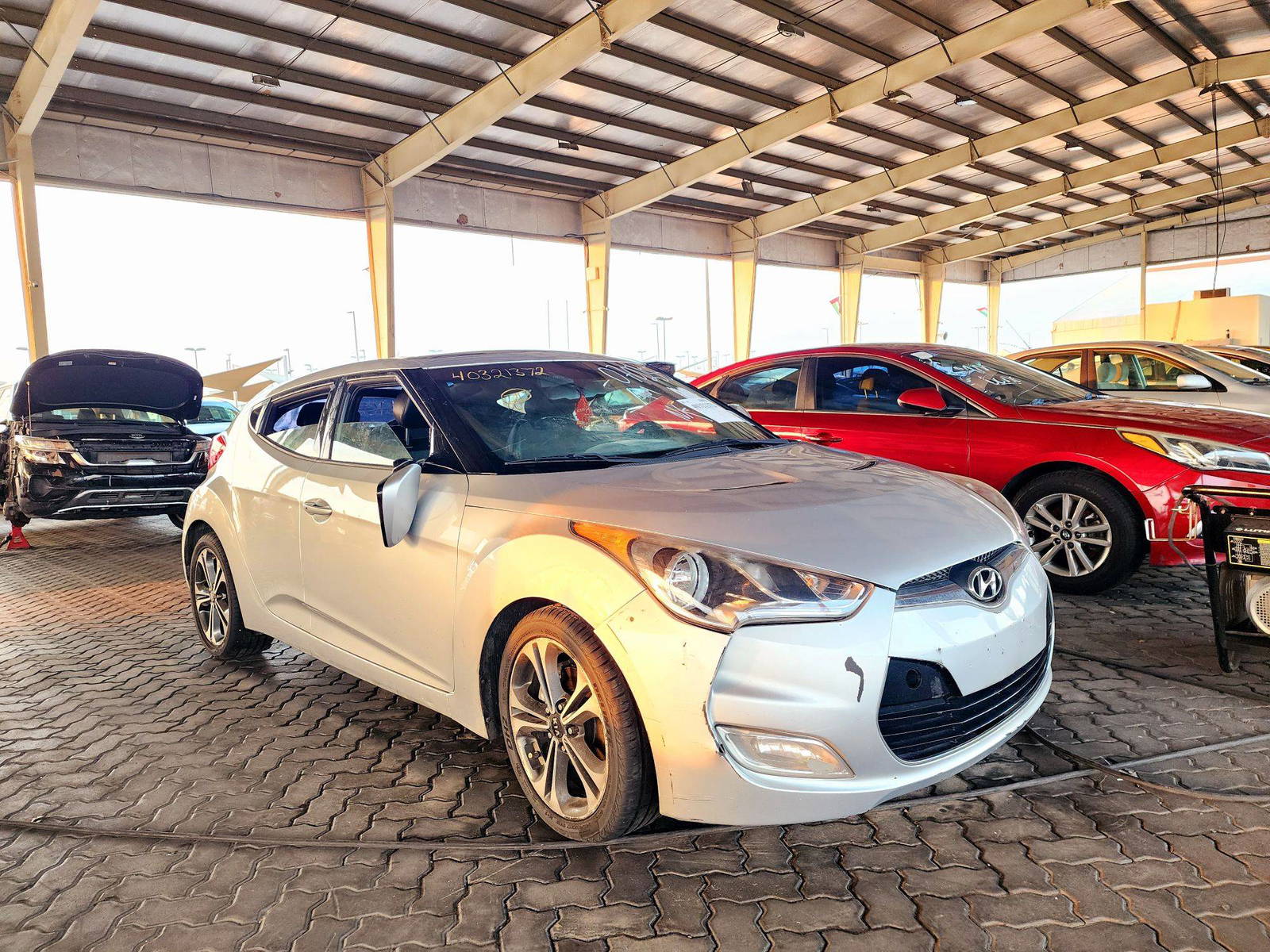 2012 HYUNDAI VELOSTER — 161969 Miles — Lot 40321372 — Souq - Marhaba Auctions Used Cars - Image 4