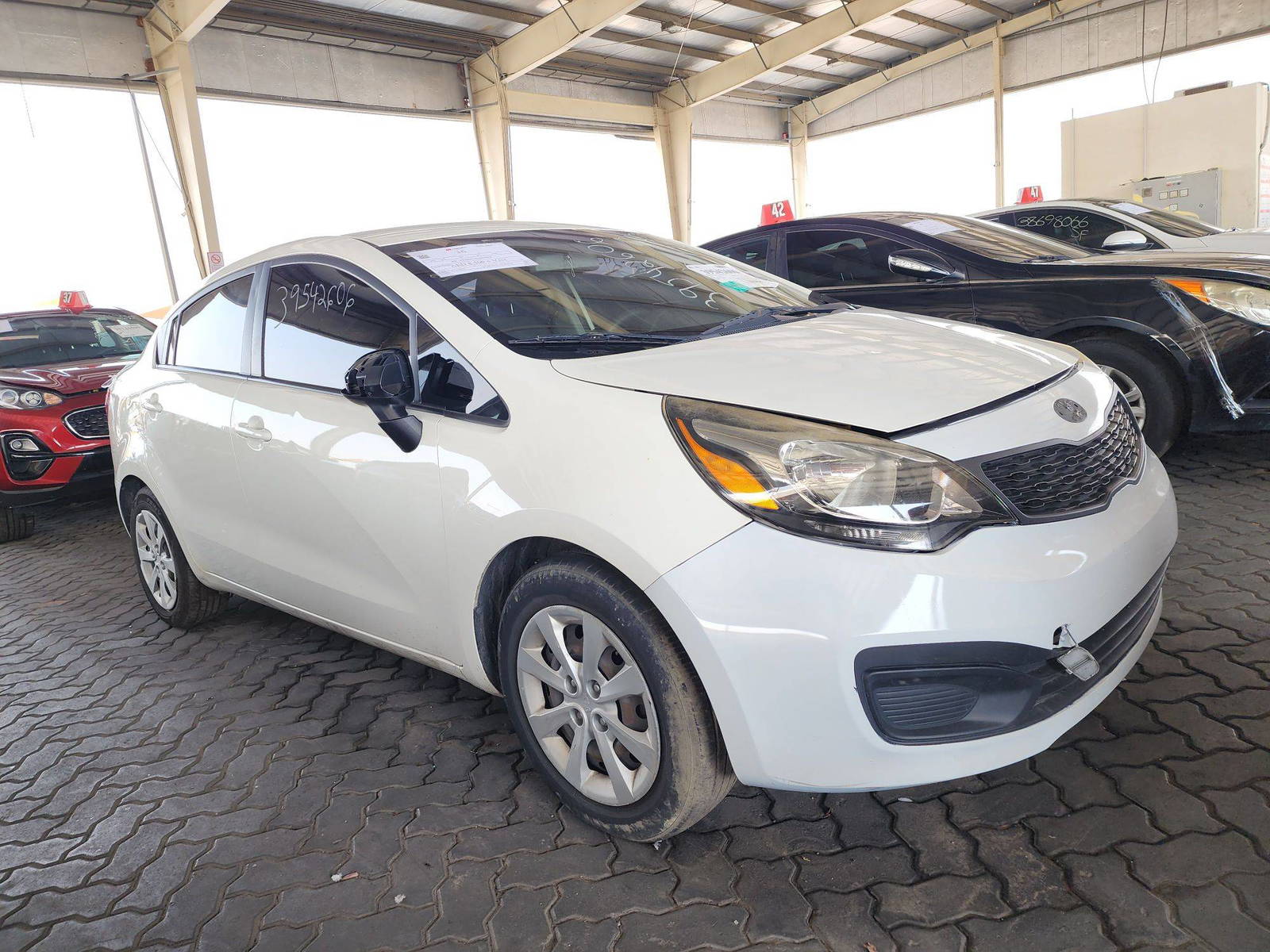 2013 KIA RIO — 148350 Miles — Lot 39542606 — Main - Marhaba Auctions Used Cars - Image 4