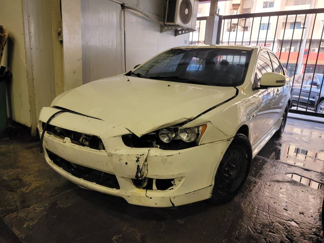 2015 MITSUBISHI LANCER — 262979 KM — Lot 12319502 — Main - Marhaba Auctions Used Cars - Image 4