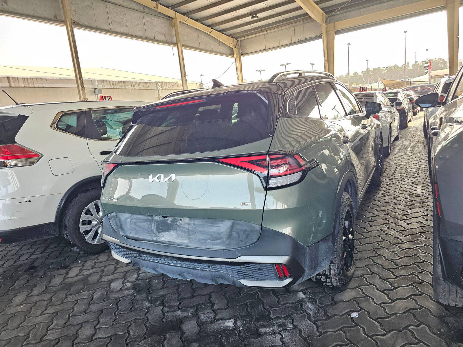 2023 KIA SPORTAGE — sold — 107840 Miles — Lot 67786725 — Souq - Marhaba Auctions Used Cars - Image 2