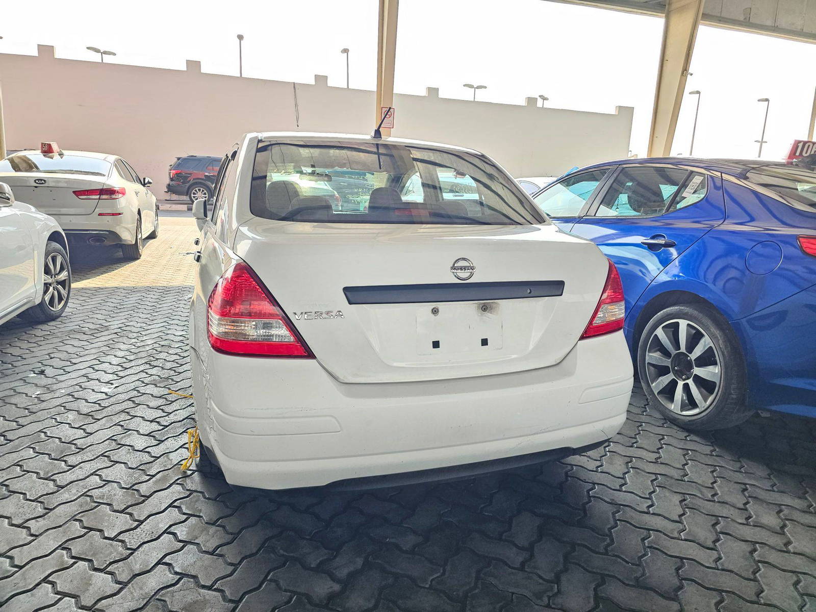 2010 NISSAN VERSA — 214363 KM — Lot 12332902 — Main - Marhaba Auctions Used Cars - Image 3