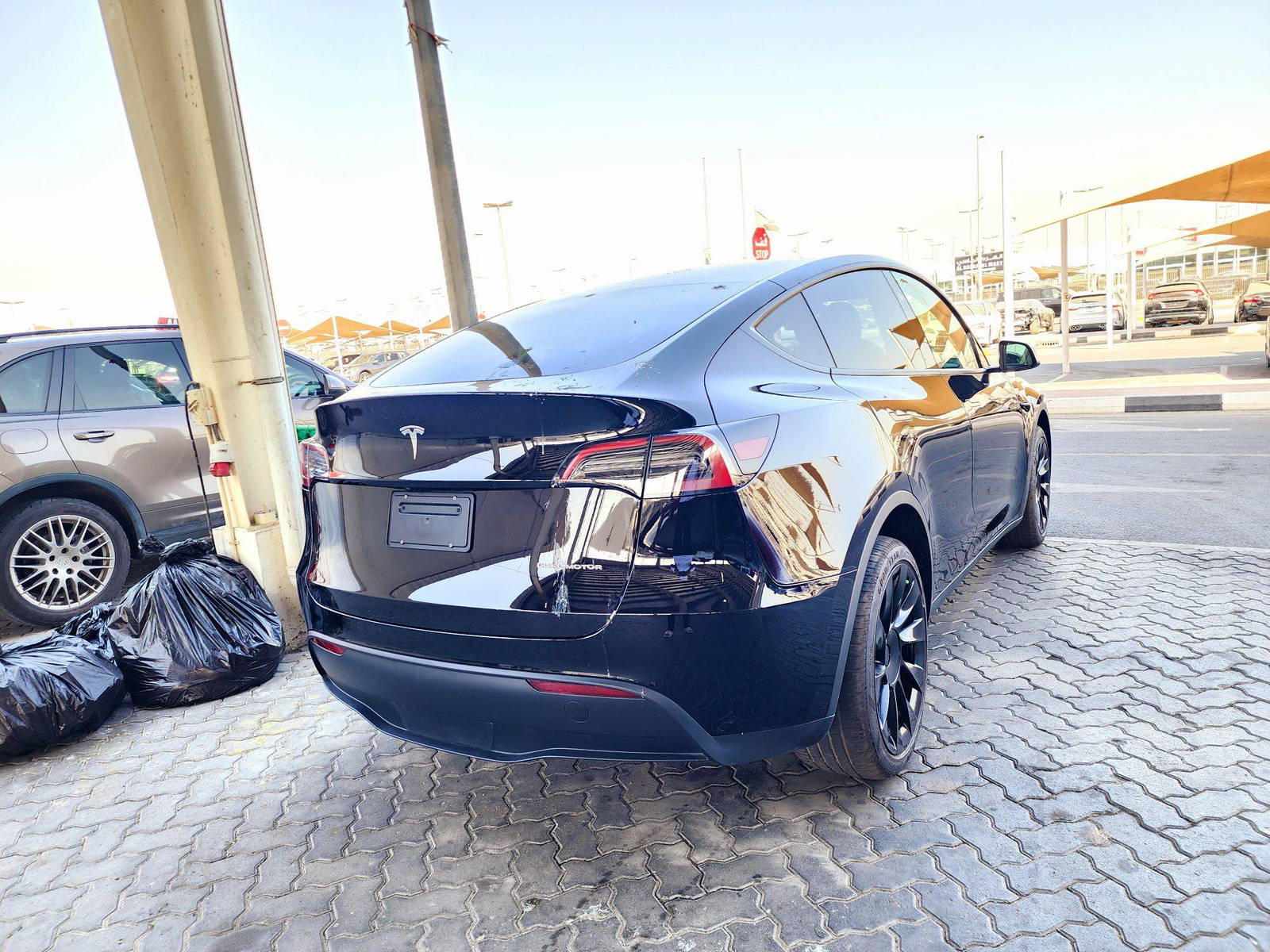 2024 TESLA MODEL Y — 15585 KM — Lot F130158 — Souq - Marhaba Auctions Used Cars - Image 3