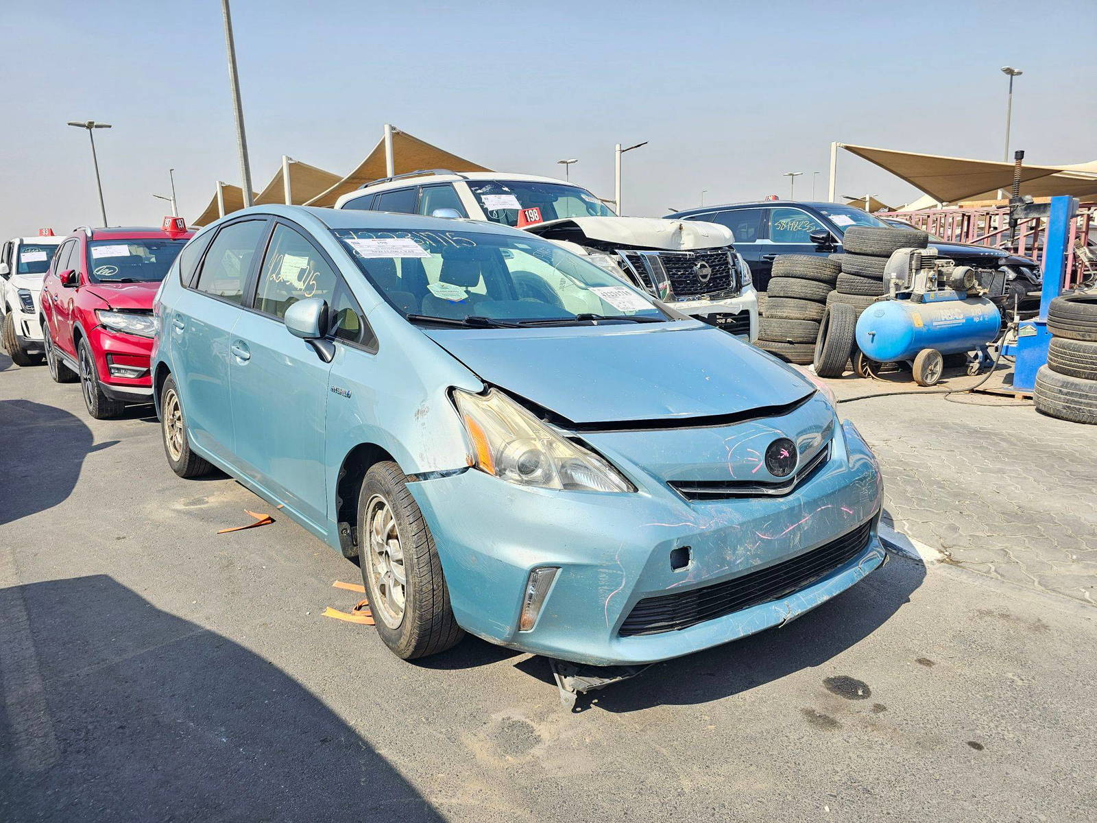 2014 TOYOTA PRIUS V — 182110 Miles — Lot 42231715 — Souq - Marhaba Auctions Used Cars - Image 5