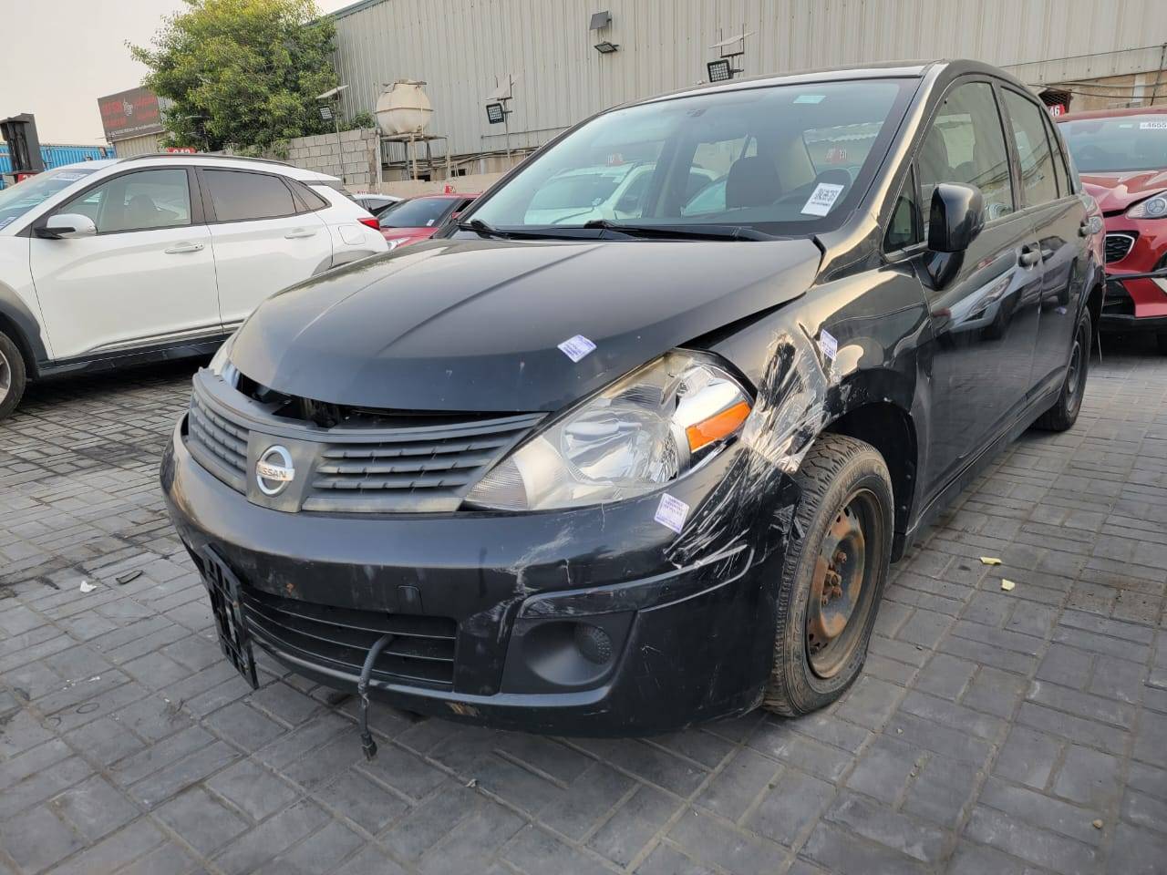 2009 NISSAN VERSA — 193223 KM — Lot E39L435327 — Main - Marhaba Auctions Used Cars - Image 4