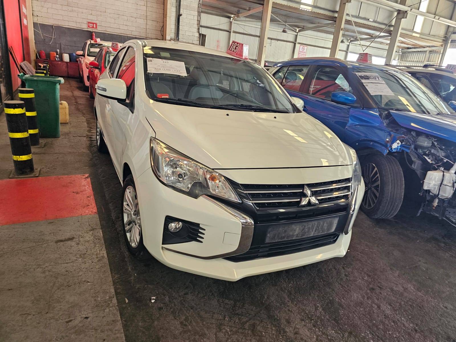2023 MITSUBISHI ATTRAGE — sold — 105451 KM — Lot 000770 — Main - Marhaba Auctions Used Cars - Image 2