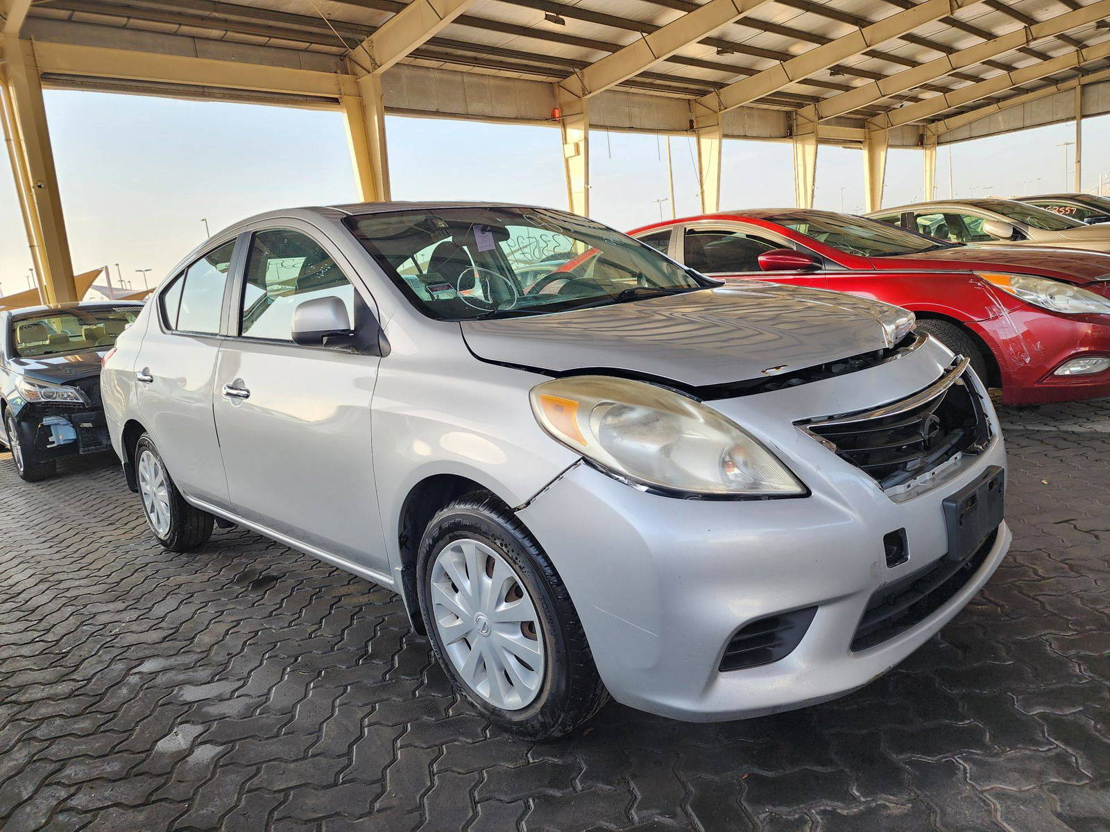 2013 NISSAN VERSA — 176480 Miles — Lot 50650394 — Souq - Marhaba Auctions Used Cars - Image 4