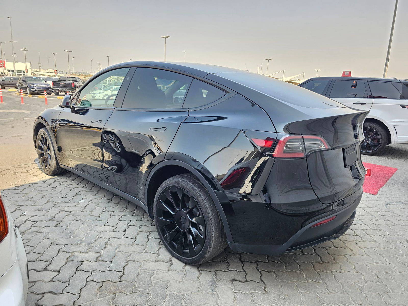2024 TESLA MODEL Y — 15593 KM — Lot E9RF130158 — Souq - Marhaba Auctions Used Cars - Image 4
