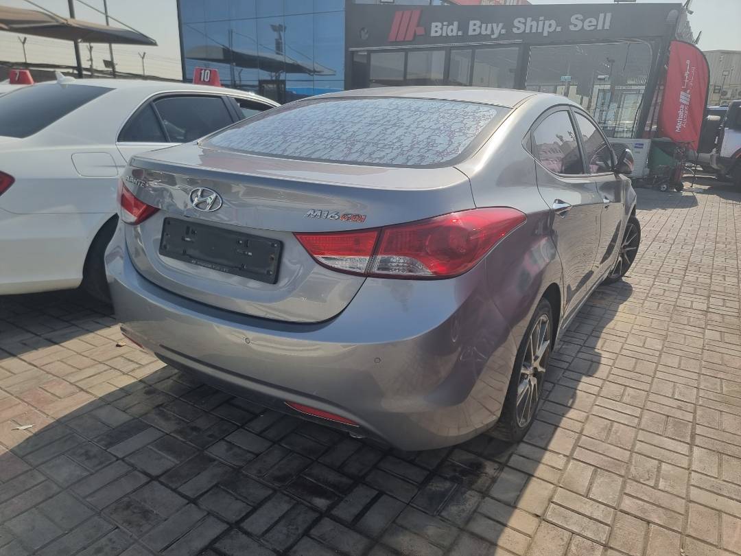 2012 HYUNDAI AVANTE — 237957 KM — Lot 615740 — Ind. 12 - Marhaba Auctions Used Cars - Image 4