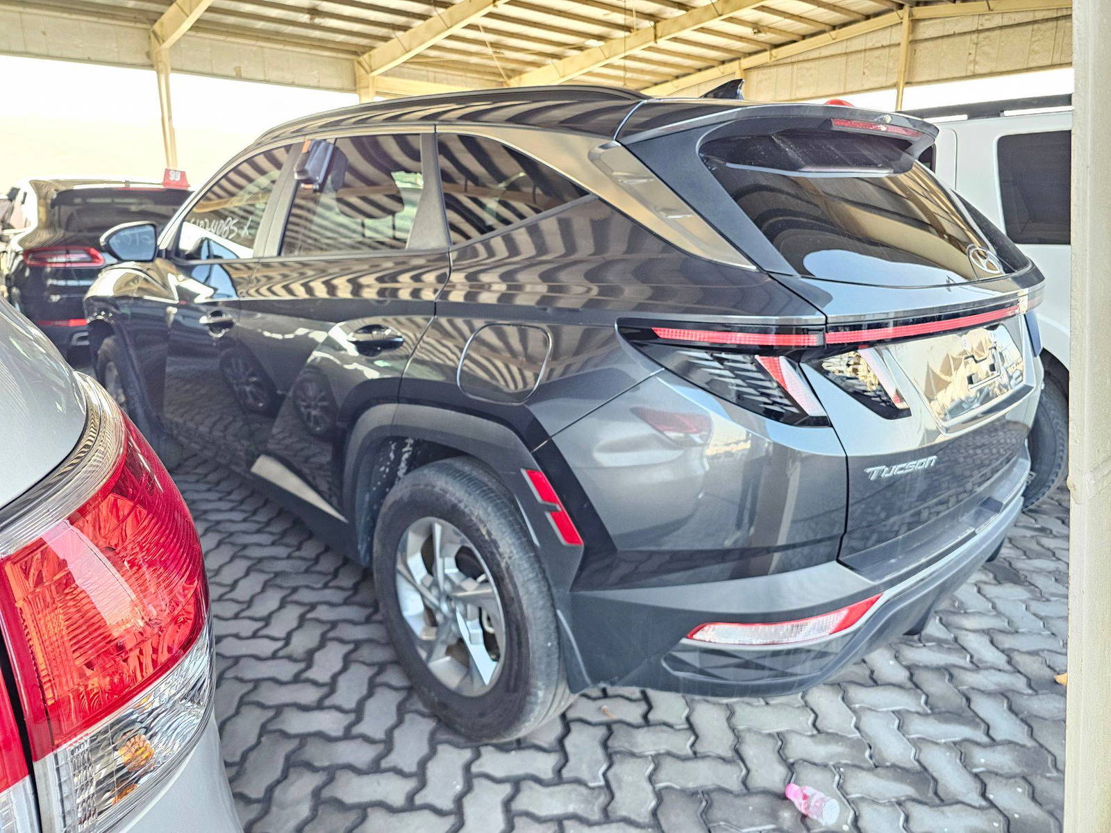 2023 HYUNDAI TUCSON — sold — 11450 Miles — Lot E0PH288297 — Souq - Marhaba Auctions Used Cars - Image 2