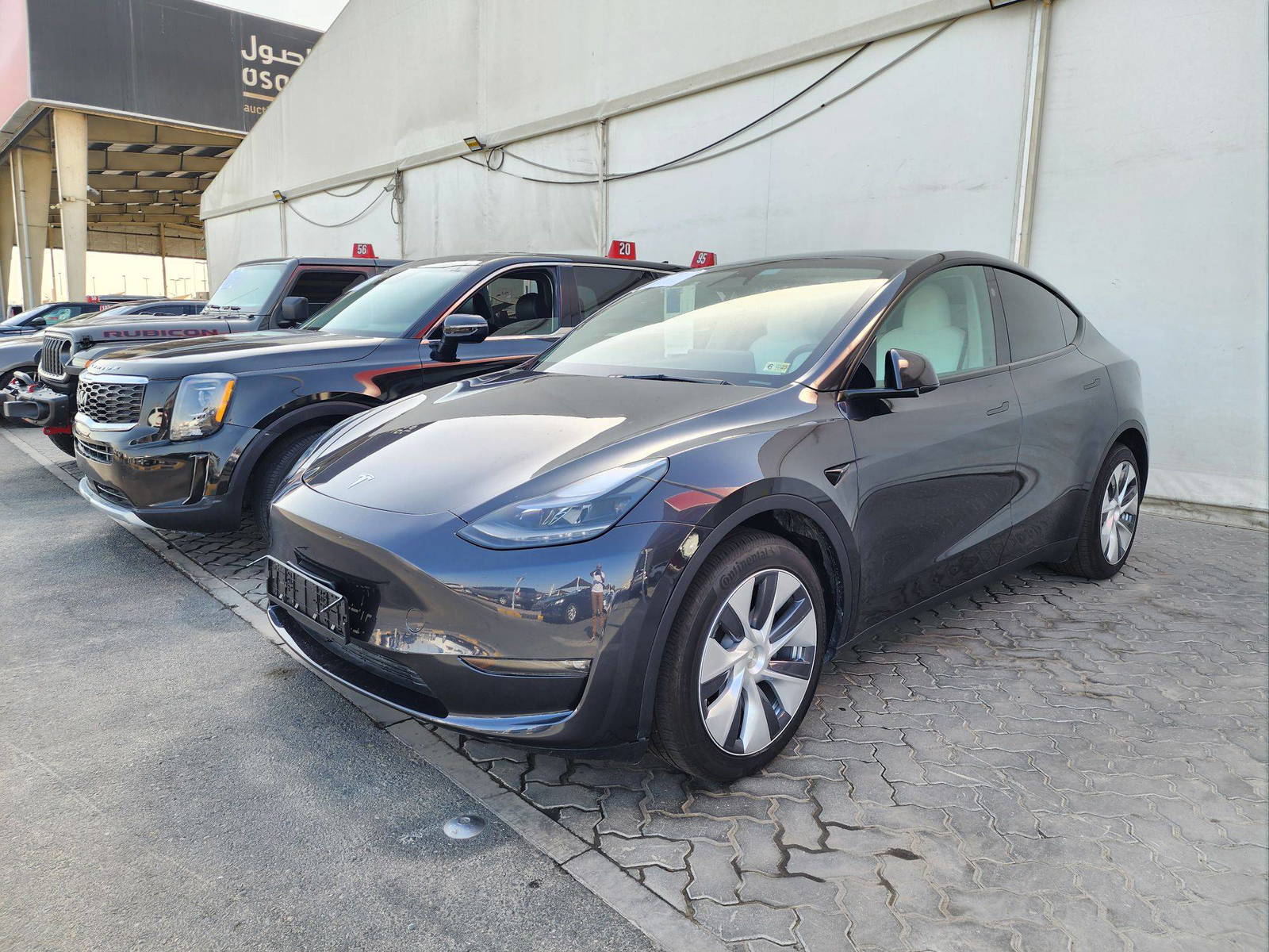 2024 TESLA MODEL Y — 5061 Miles — Lot RF072732 — Souq - Marhaba Auctions Used Cars - Image 4