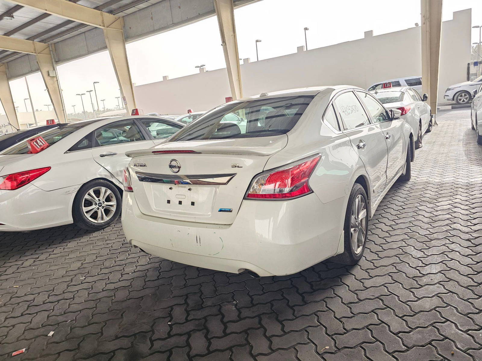 2014 NISSAN ALTIMA — 220167 Miles — Lot 43032870 — Main - Marhaba Auctions Used Cars - Image 4