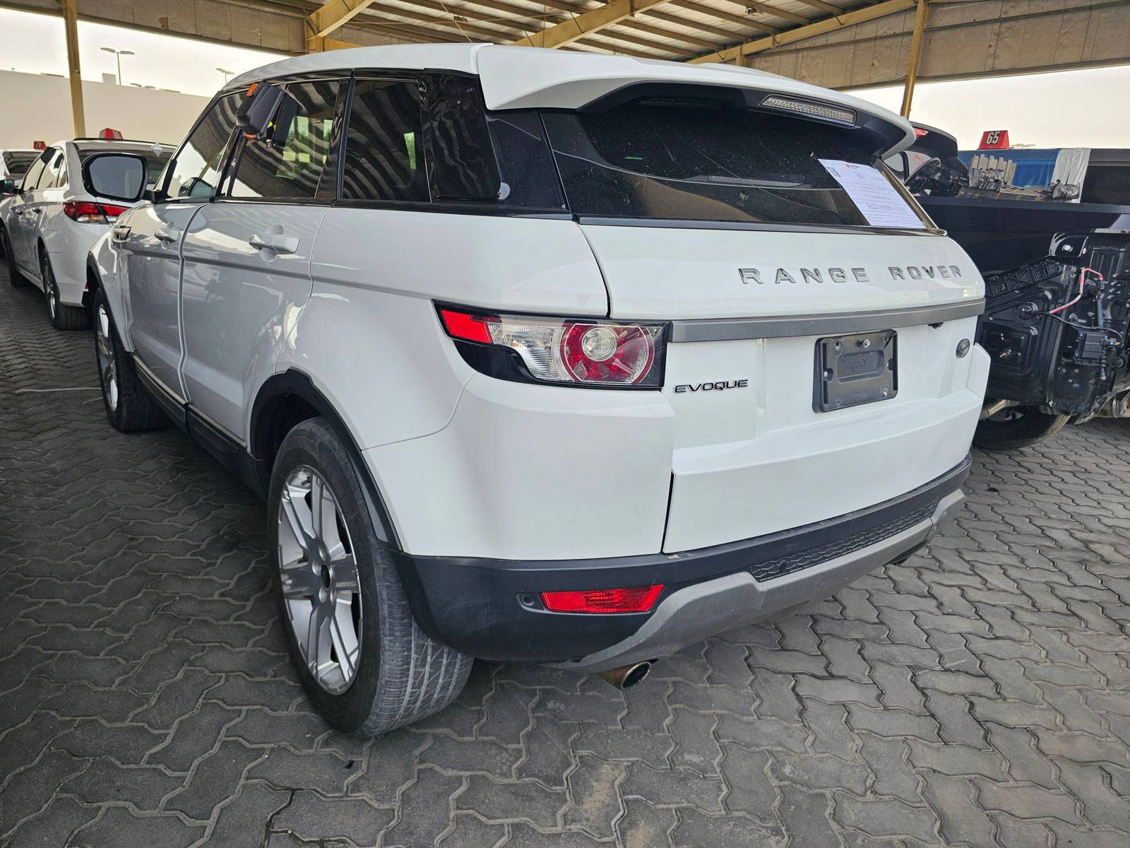 2013 LAND ROVER RANGE ROVER EVOQUE PURE — 153455 Miles — Lot H748468 — Souq - Marhaba Auctions Used Cars - Image 4