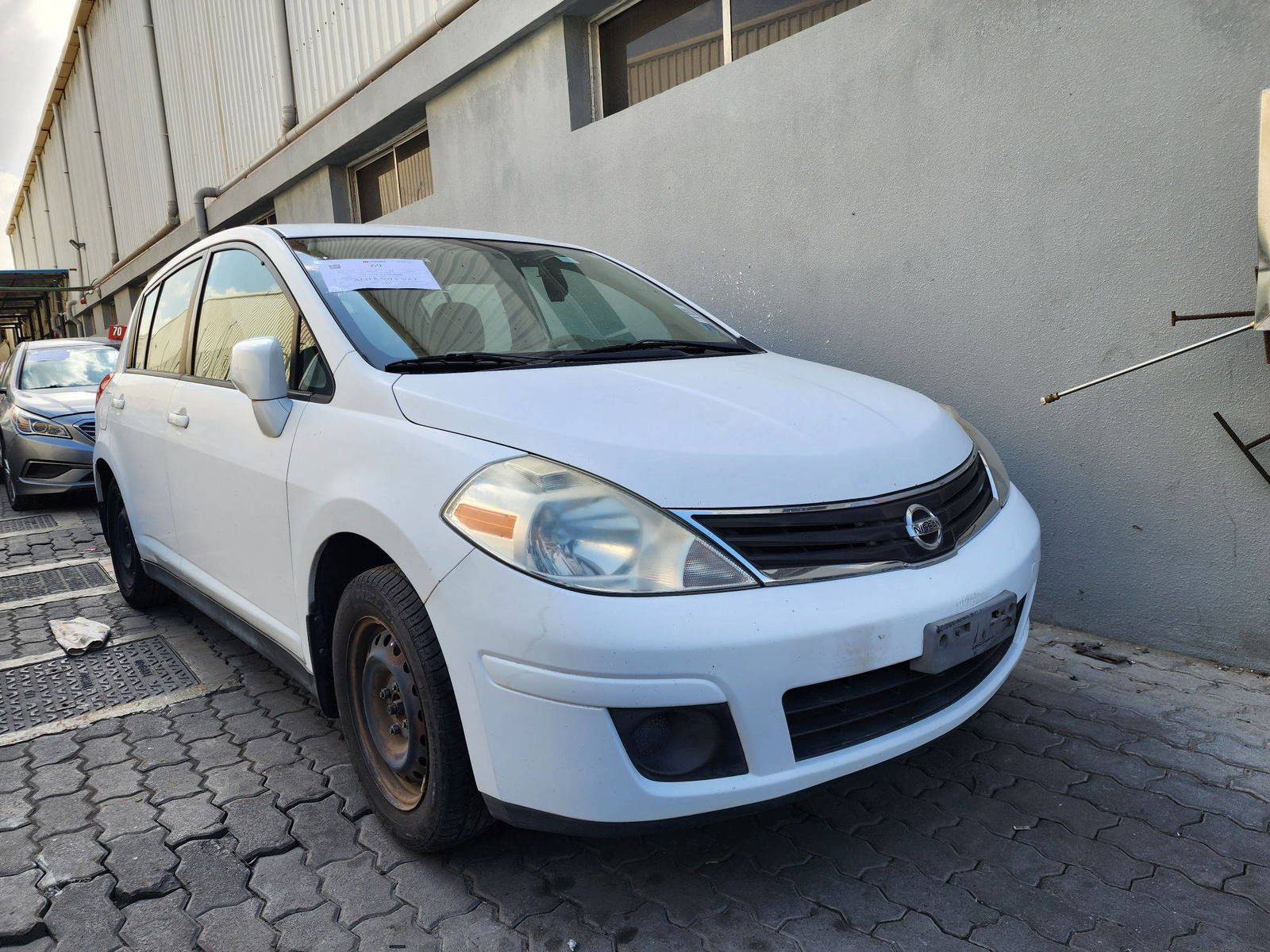 2011 NISSAN VERSA — 153993 Miles — Lot 40892343 — Al Quoz - Marhaba Auctions Used Cars - Image 3