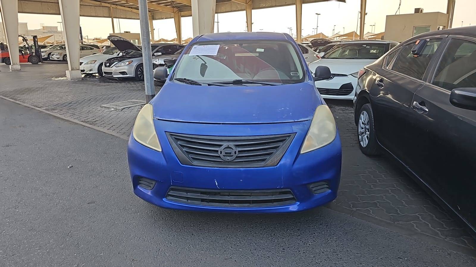 2014 NISSAN VERSA — 133819 Miles — Lot 4EL857650 — Souq - Marhaba Auctions Used Cars - Image 3