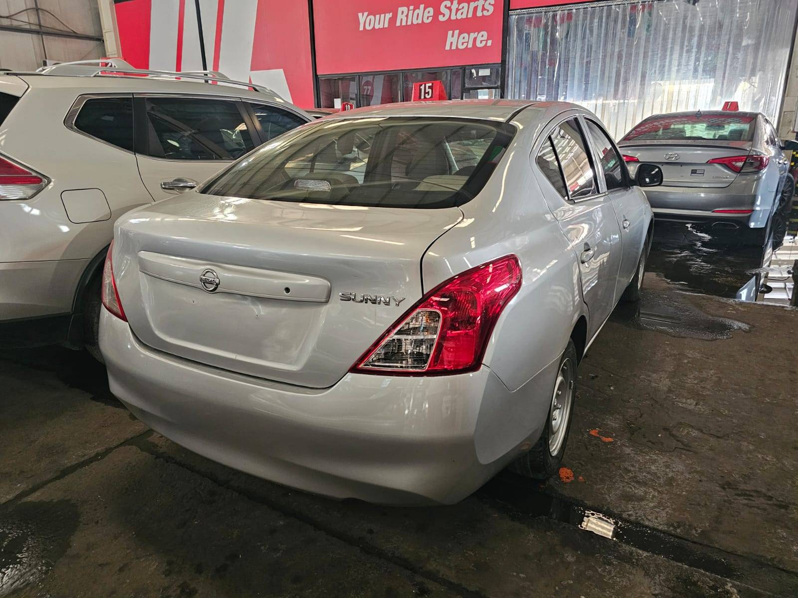 2013 NISSAN SUNNY — 303007 KM — Lot MDHBN7A — Main - Marhaba Auctions Used Cars - Image 3
